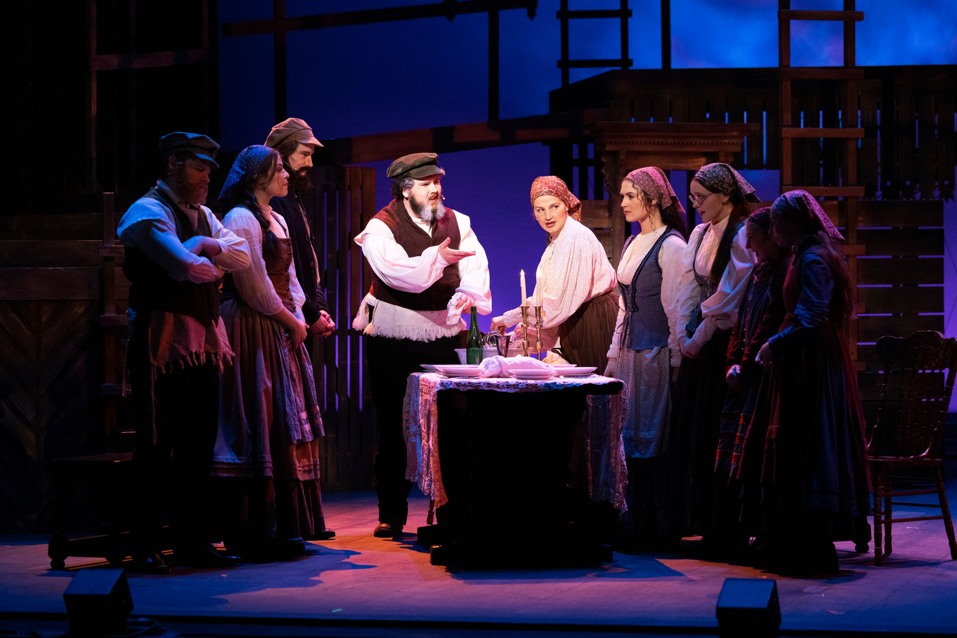 The Fiddler on the Roof ensemble on stage