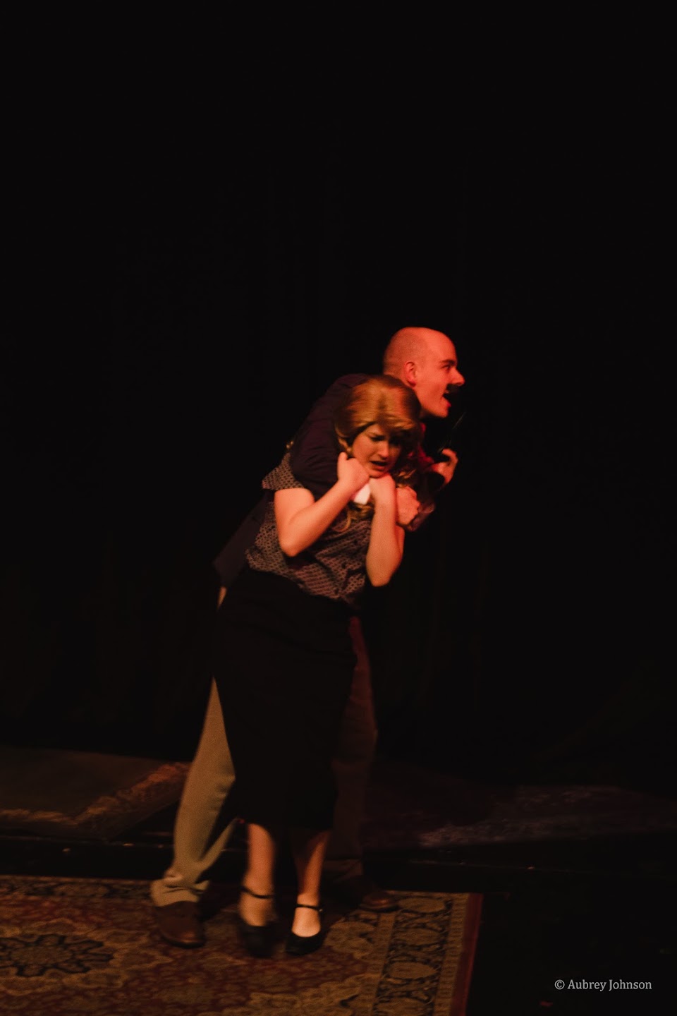 Two actors in a tense moment during The 39 Steps
